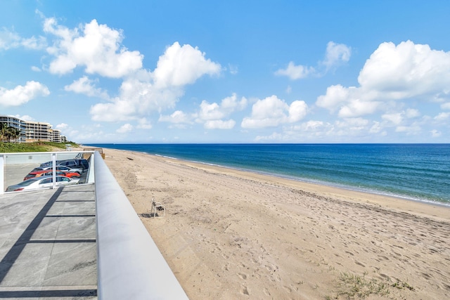 view of water feature with a beach view