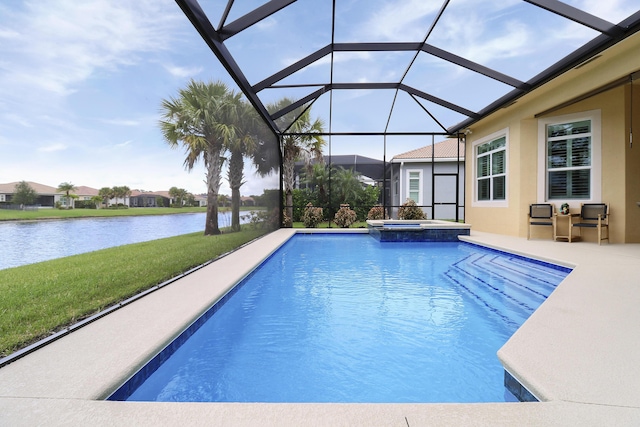 view of pool featuring glass enclosure, a water view, a yard, an in ground hot tub, and a patio area