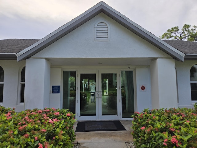 property entrance featuring french doors