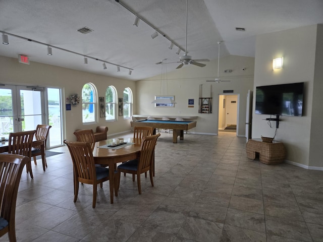 dining space with french doors, rail lighting, a textured ceiling, ceiling fan, and pool table