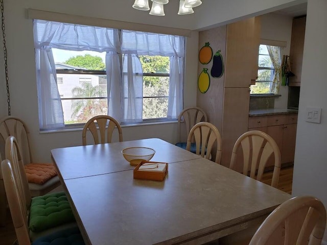 dining room featuring a chandelier