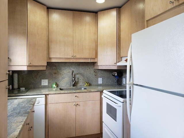 kitchen featuring sink, light brown cabinets, tasteful backsplash, white appliances, and exhaust hood