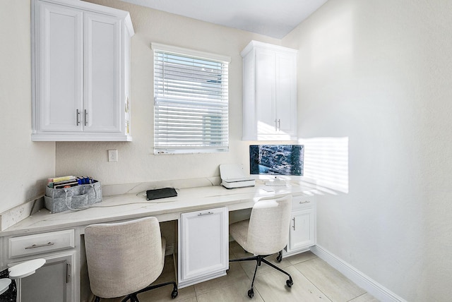 office area featuring light tile patterned floors