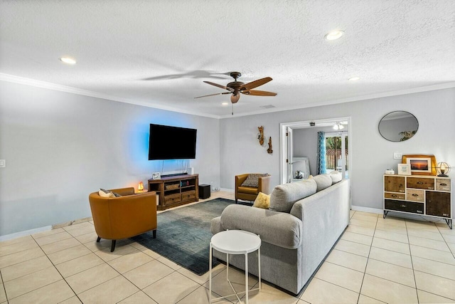 living room featuring ceiling fan, light tile patterned flooring, crown molding, and a textured ceiling