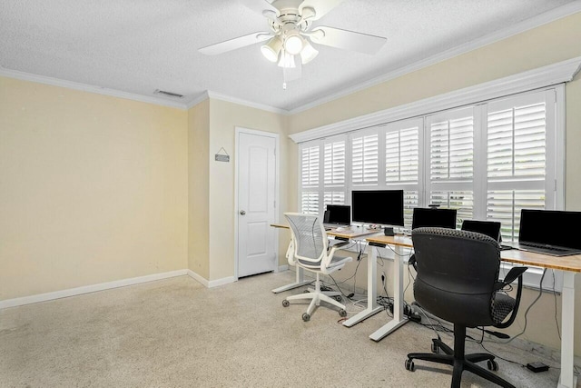 office with a textured ceiling, ceiling fan, and crown molding