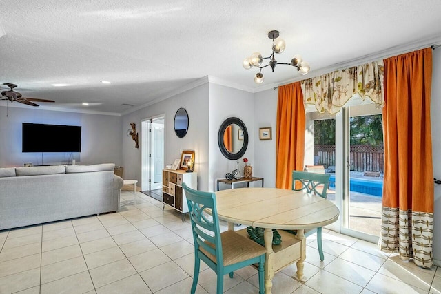 dining space with crown molding, light tile patterned floors, ceiling fan with notable chandelier, and a textured ceiling