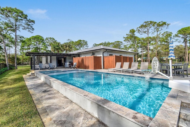 view of pool featuring a patio