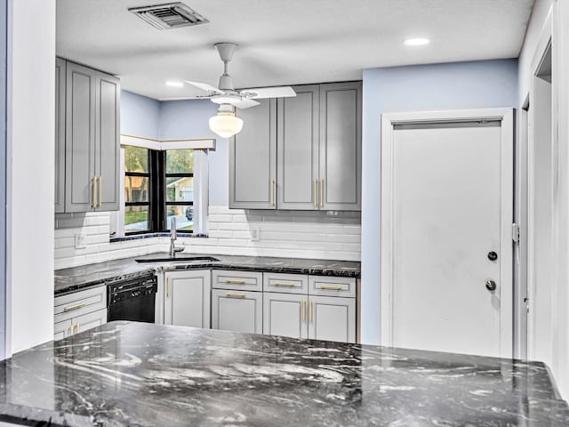 kitchen with gray cabinets, sink, and black dishwasher