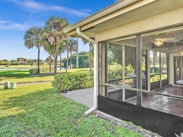 view of yard with a sunroom