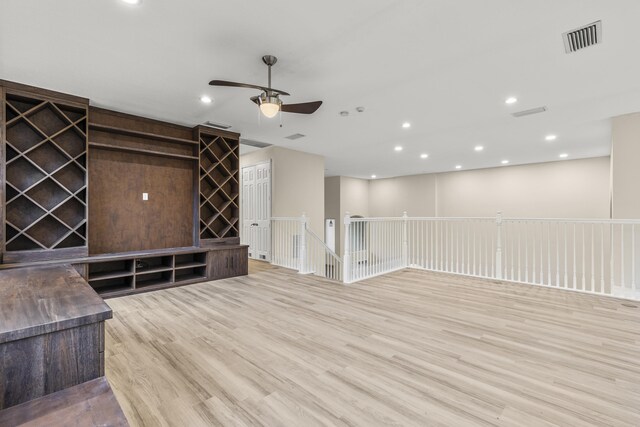 washroom with electric dryer hookup, cabinets, sink, hookup for a washing machine, and a textured ceiling