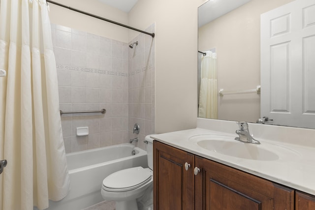 full bathroom with vanity, toilet, and shower / tub combo