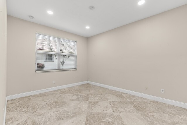 entryway featuring french doors, a notable chandelier, and a high ceiling