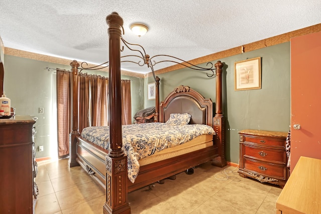 tiled bedroom featuring a textured ceiling