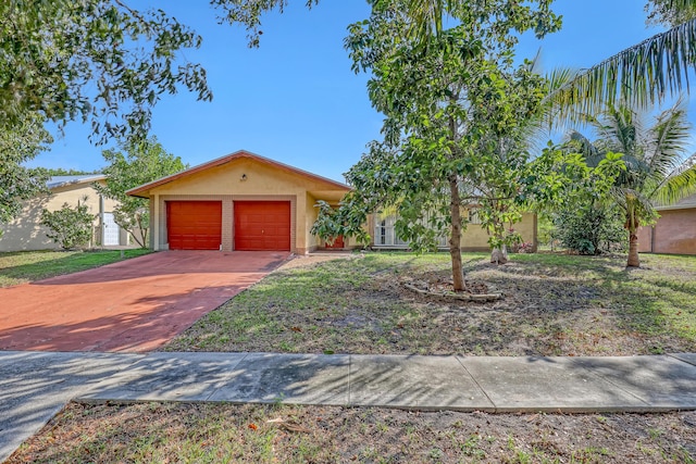 ranch-style home with a garage