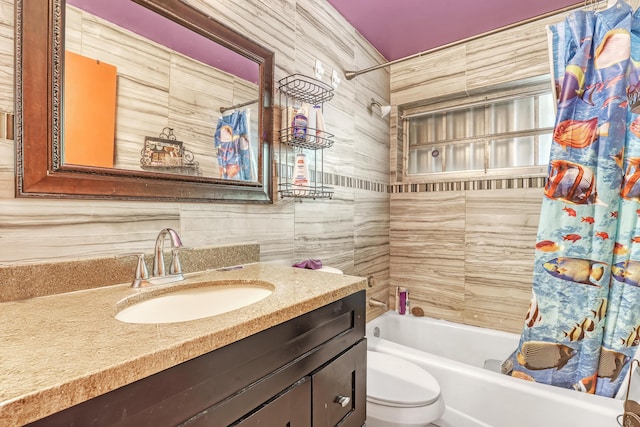 full bathroom featuring shower / tub combo, vanity, and toilet