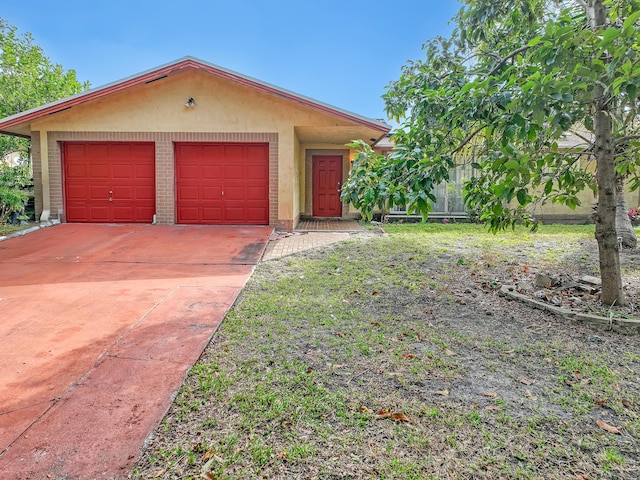 single story home with a garage