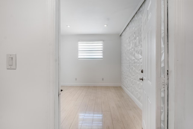 unfurnished room featuring light hardwood / wood-style floors