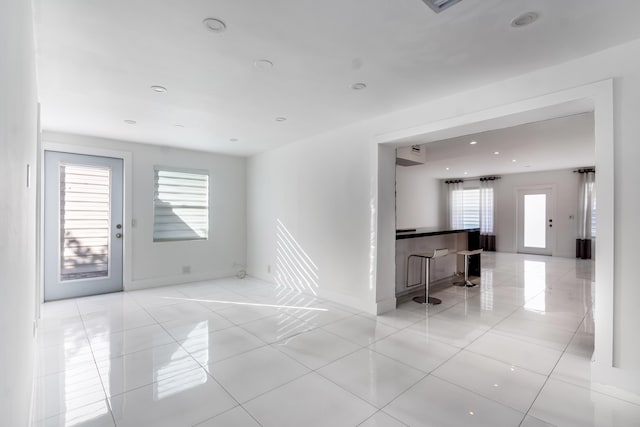 interior space featuring light tile patterned floors