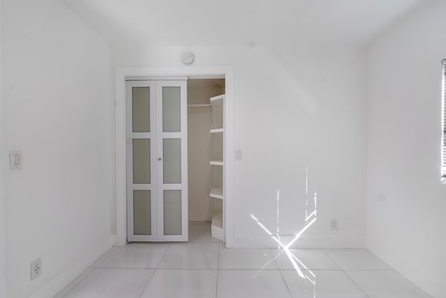 interior space featuring light tile patterned floors