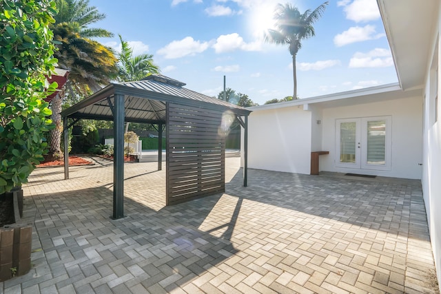 view of patio / terrace with a gazebo and french doors