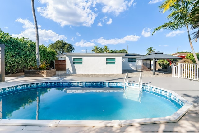 view of swimming pool with a gazebo