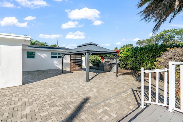 view of patio with a gazebo and area for grilling