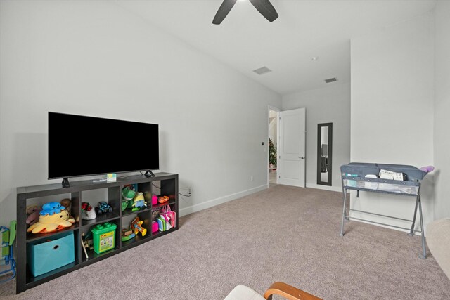 playroom with light tile patterned flooring, sink, and ceiling fan