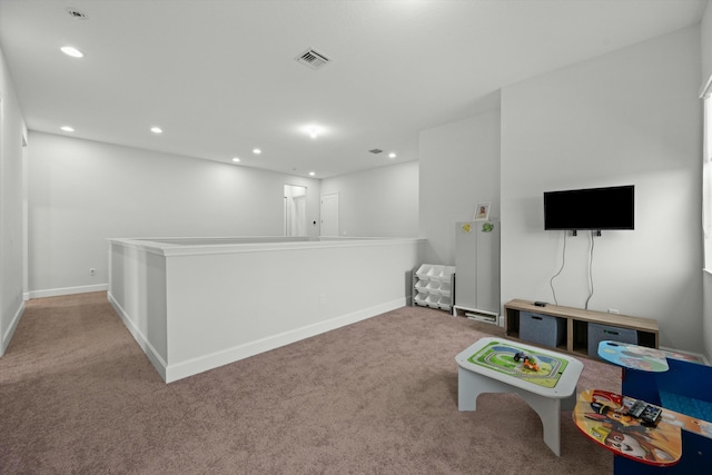 playroom featuring light carpet, baseboards, visible vents, and recessed lighting