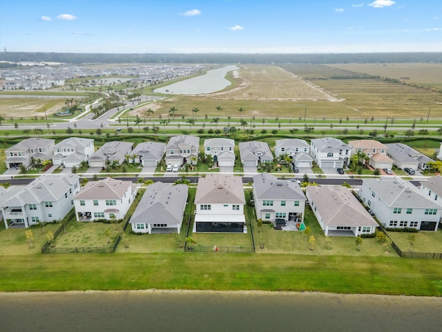 aerial view with a water view and a residential view