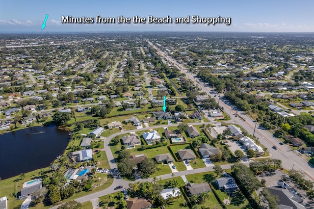 drone / aerial view featuring a water view