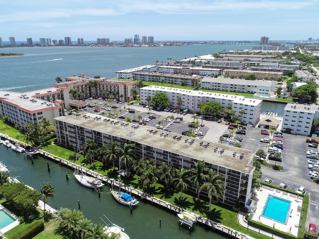 birds eye view of property featuring a water view