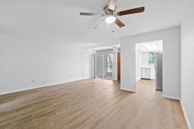 109 Paradise Harbour Blvd Unit 309, North Palm Beach, FL 33408 - unfurnished living room featuring ceiling fan and light wood-style floors
