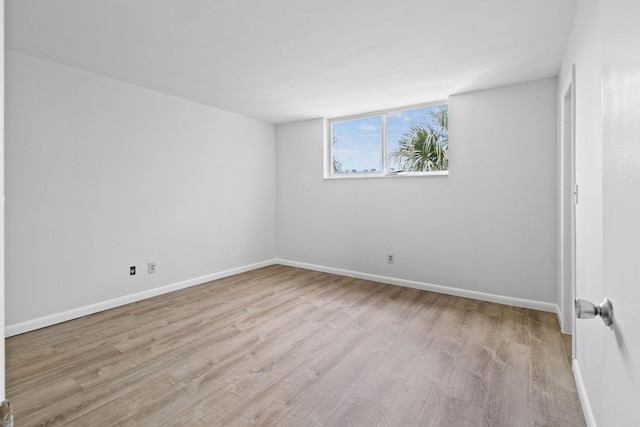 109 Paradise Harbour Blvd Unit 309, North Palm Beach, FL 33408 - spare room with wood finished floors and baseboards