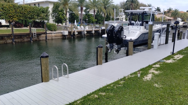 dock area featuring a water view