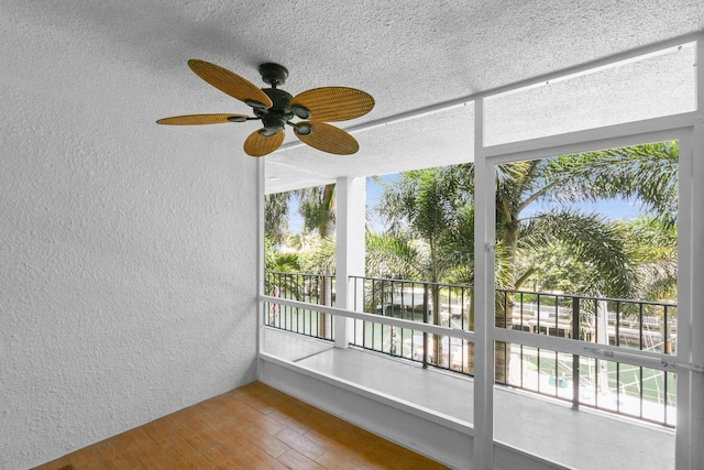 109 Paradise Harbour Blvd Unit 309, North Palm Beach, FL 33408 - unfurnished sunroom featuring plenty of natural light
