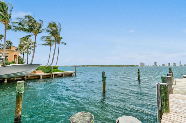 109 Paradise Harbour Blvd Unit 309, North Palm Beach, FL 33408 - dock featuring a water view