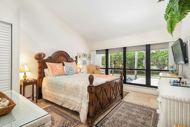 bedroom with vaulted ceiling