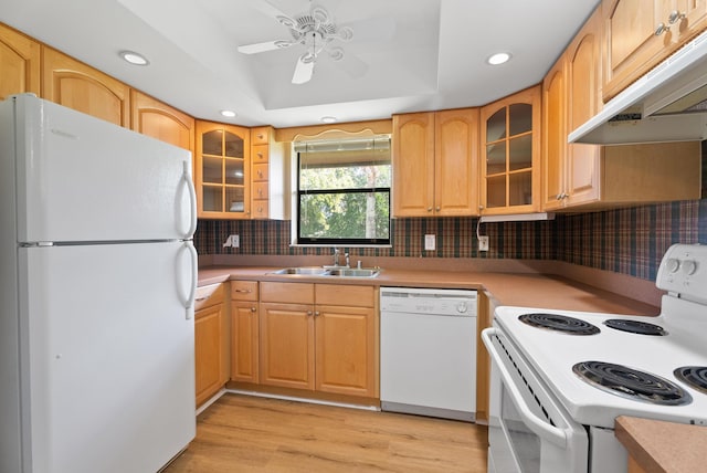 151 SW S River Dr Unit 203, Stuart, FL 34997 - kitchen with white appliances, under cabinet range hood, a ceiling fan, light wood-style flooring, and recessed lighting