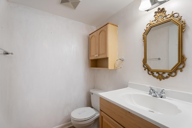 151 SW S River Dr Unit 203, Stuart, FL 34997 - bathroom featuring toilet and vanity