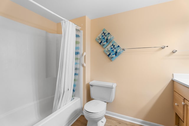 151 SW S River Dr Unit 203, Stuart, FL 34997 - bathroom featuring vanity, wood finished floors, and shower / bath combination with curtain