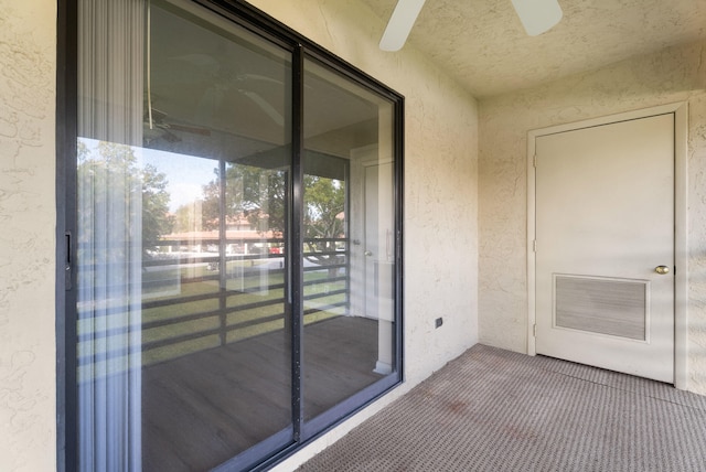 151 SW S River Dr Unit 203, Stuart, FL 34997 - balcony with ceiling fan