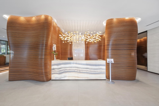 reception area with a notable chandelier