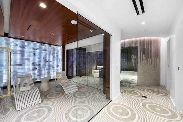 bathroom with wooden ceiling