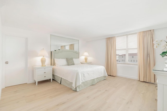 bedroom featuring light wood-type flooring