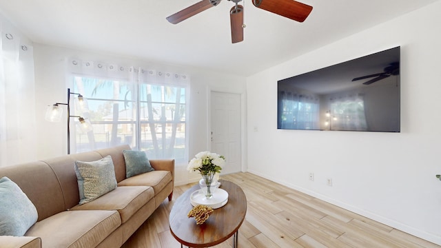 living room with light hardwood / wood-style flooring