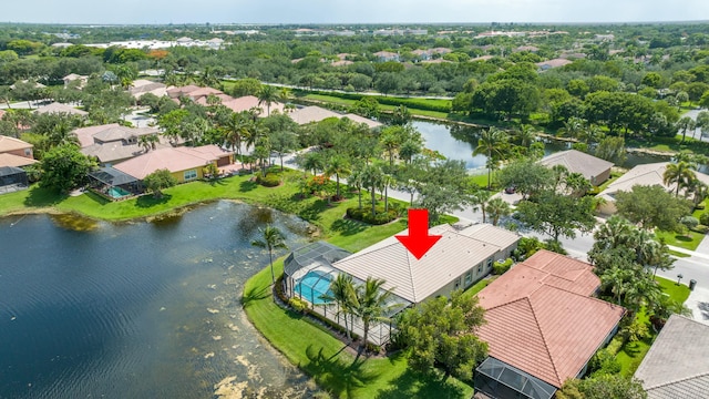 birds eye view of property featuring a residential view and a water view