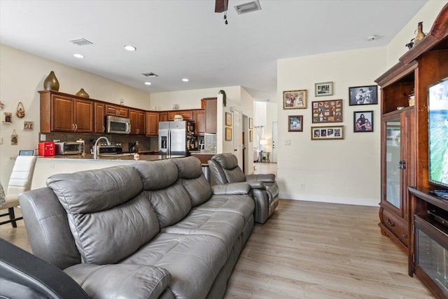 living room with light wood-type flooring