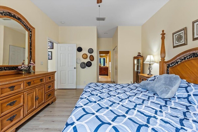 bedroom with light wood-type flooring