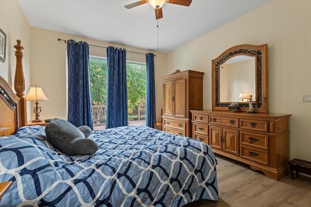 bedroom featuring access to exterior, light wood-type flooring, and ceiling fan