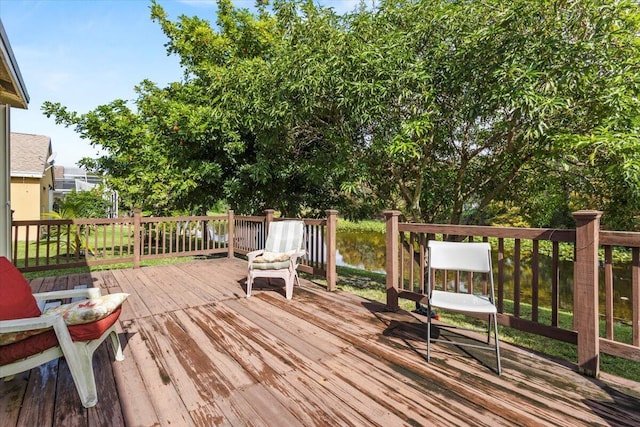 wooden terrace with a water view